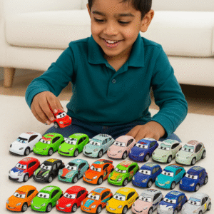 Young Pakistani boy playing with colorful pull back alloy cars for kids on a carpet